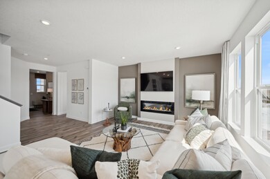 (Photo of model home, finishes will vary) Another angle of this bright and spacious family room!