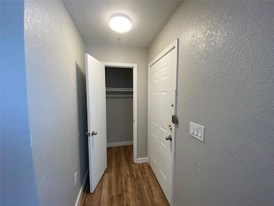 This is a view of the foyer. Notice the coat close