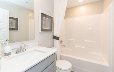 Photo is of a similar home or model.