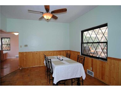Dining Room. Beautiful windows add nice detail and