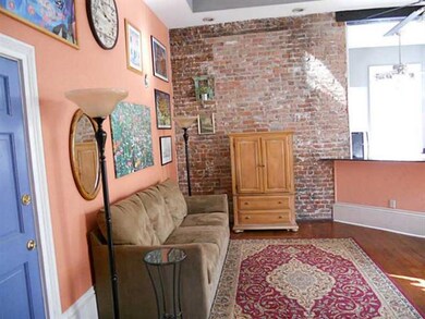 Photo. Living view towards kitchen