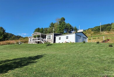 582 John Henry Rd, Burnsville, NC 28714 - photo 4