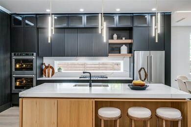 Kitchen with light hardwood / wood-style flooring,
