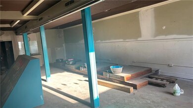 Suite 1B on right side of building