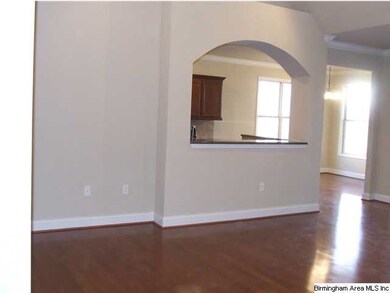 Wood flooring in the foyer, family room, breakfast