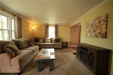 New windows and carpet complement this lovely livi