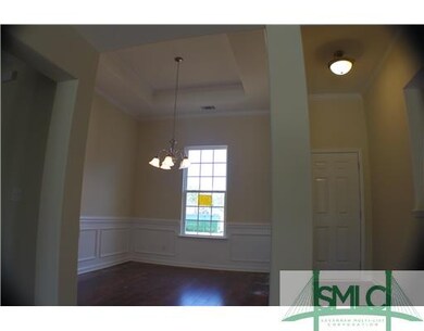 Dining Room. Trey ceiling highlights the dining ro