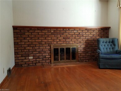 Original hardwood floors, gas fireplace.