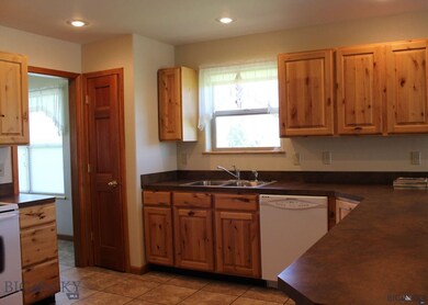 Kitchen is right off the dining room, but hidden a