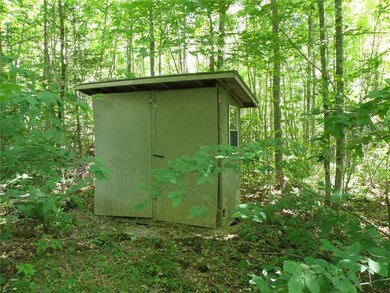 Other. Outhouse on one side- storage...
