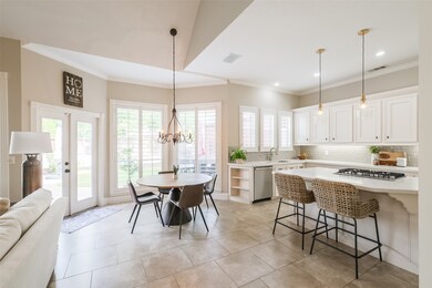 The kitchen and family room are filled with natural light but NOT direct sunlight as it faces north.