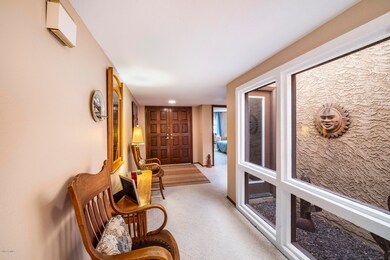 Interior Atrium Brightens the Home