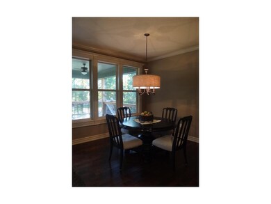 Breakfast Room with view of treed backyard