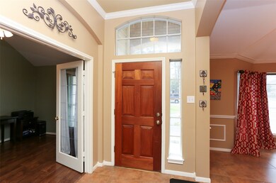 There is a Study and a Dining Room located on each side of the Entry.