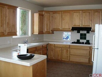 Kitchen with custom cabinetry,