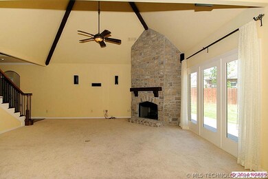 The over-sized family room offers a soaring, vault