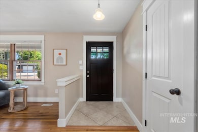 Entryway featuring healthy amount of natural light and light wood finished floors