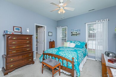 Master bedroom with tons of natural light and En S