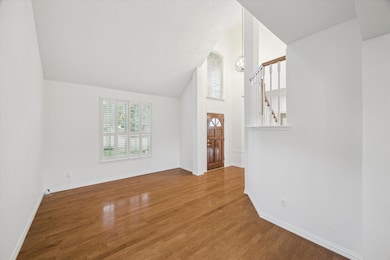 From the 2-story foyer, you'll enter the formal living or flex room. The entire house was freshly painted prior to listing.