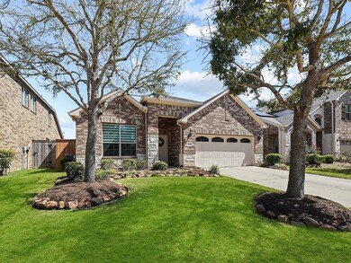 Boasting exceptional curb appeal with a sophistica