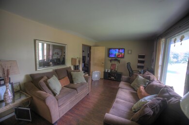 Large living area with plenty of natural light.