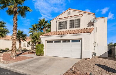 Mediterranean / spanish-style house featuring a ti