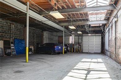 View of controlled access garage with 1 dedicated