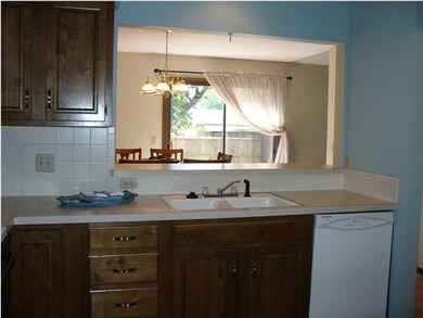 KITCHEN WITH EATING BAR AND PASS THRU