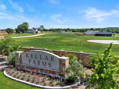 Community sign featuring a lawn