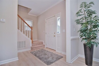 Foyer entrance with room for a 