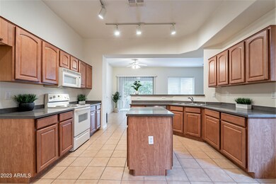 Maple Cabinets and Corian Counters!