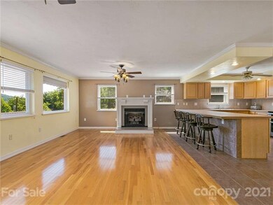 An open concept floor plan with a fantastically large breakfast bar makes for easy entertaining!