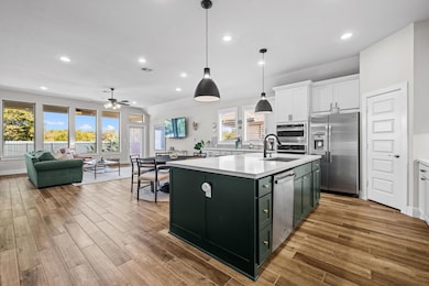 Kitchen with a sink, stainless steel appliances, 