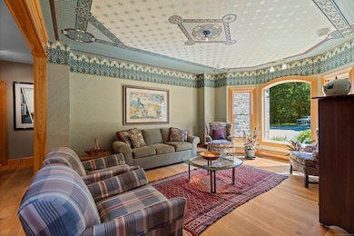 Arts & crafts overtones abound including extensive millwork and heritage fixures