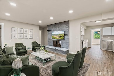 Family Room Upstairs with 2 sided Fire Place -Virtually Staged
