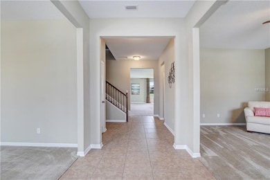 Entrance through grand foyer.