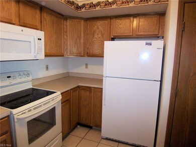 Kitchen featuring all appliances, oak cabinets, ce