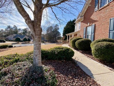 Strolling up the walkway towards the front porch