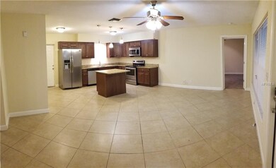 LIVING ROOM WIH VIEW OF KITCHEN (VIEW #2)