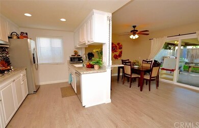 HERE IS A REMODELED KITCHEN WITH GRANITE COUNTER T
