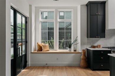 Dining space with light wood finished floors and 
