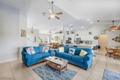 Living area with light tile patterned floors, visi