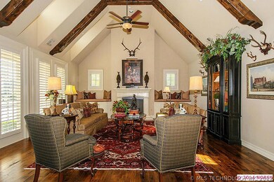 EXQUISITE LIVING ROOM WITH VAULTED & BEAMED CEILIN