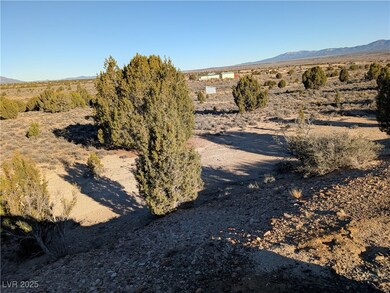 View of mountain backdrop featuring a desert landscape and rural landscape