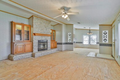 Another view of the front living space looking towards the dining room.