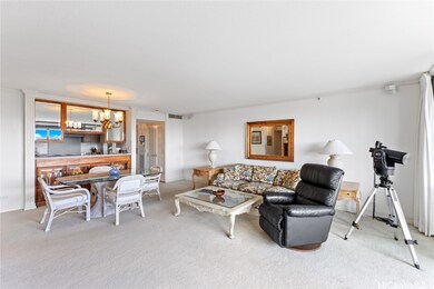 Open and airy living room seamlessly flows into th