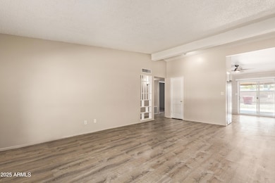 Living room facing kitchen
