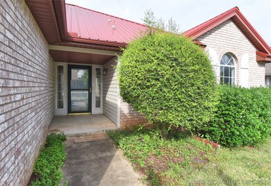 Front porch entry w/ plenty of space to add your f