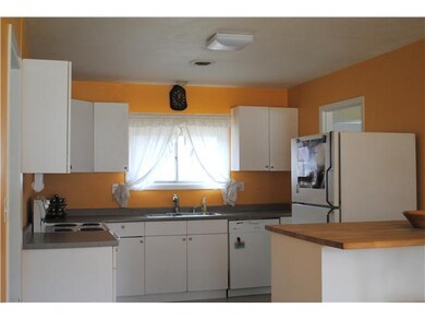 Kitchen. Kitchen opens to Dining Area.