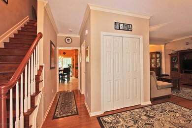 Entry foyer view into kitchen